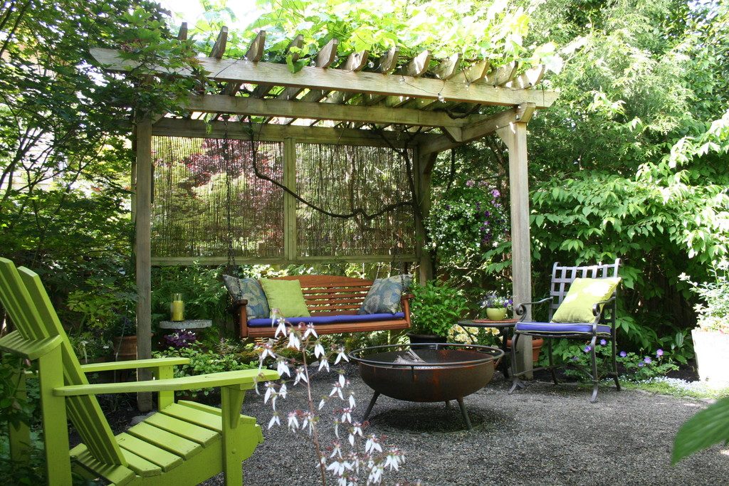 patio bench and trellis in garden