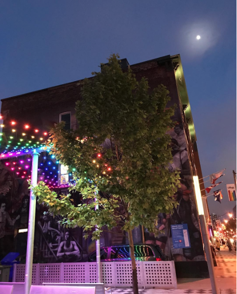 Toronto's Church and Wellesley neighbourhood at night with rainbow lights