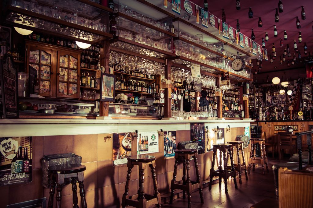 classic pub with wooden stools 