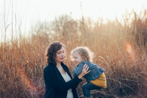 Mother and child in field